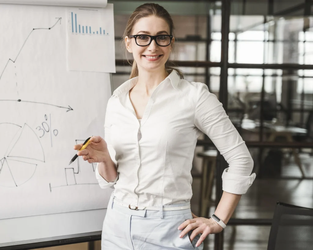 smiley-professional-businesswoman-with-glasses-giving-presentation (1)